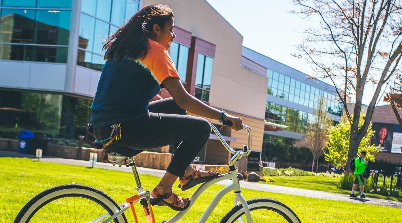 Student riding bike