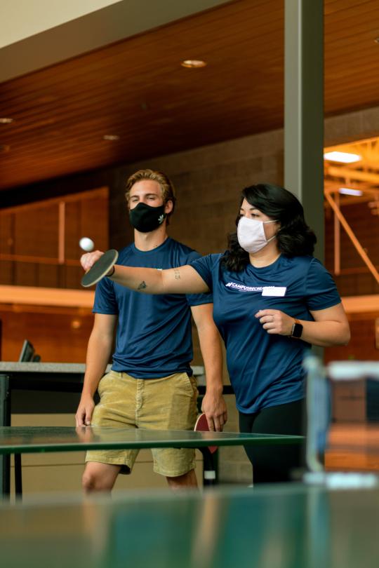 Students playing table tennis