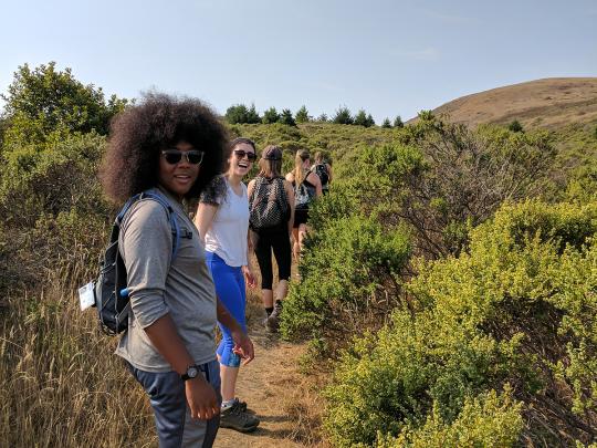 a group of students on a trail