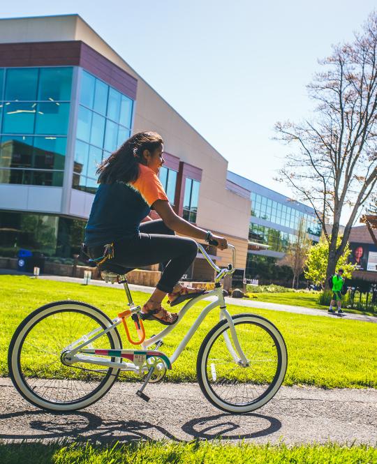 Student riding bike