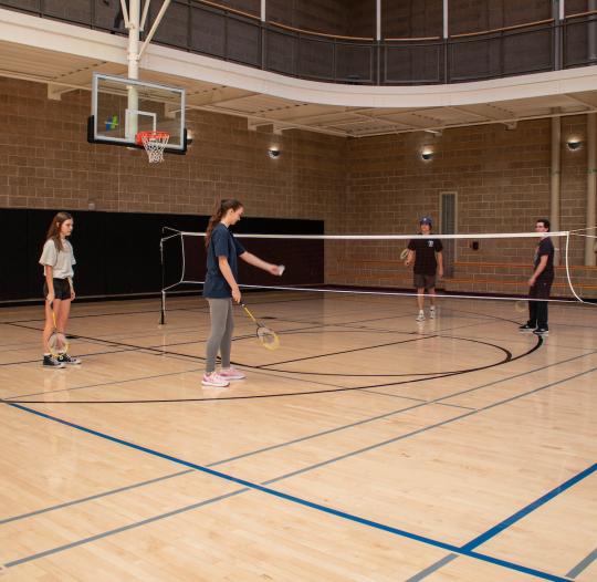 students playing badminton