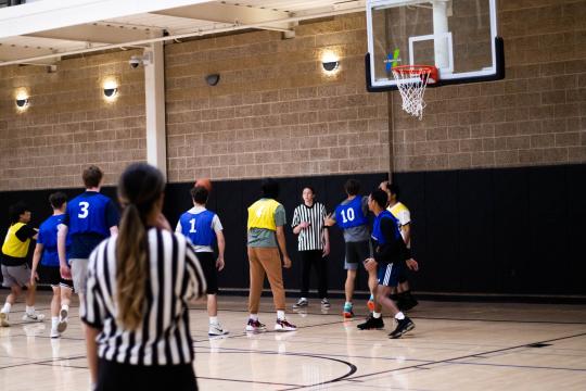 students playing basketball